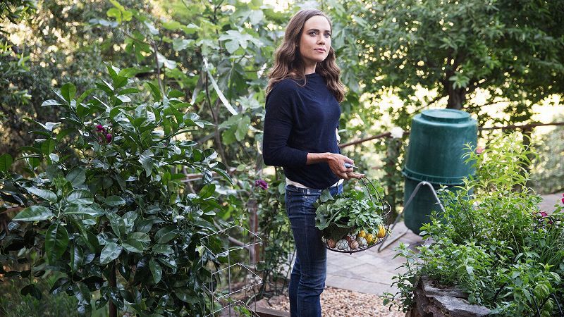 As a professional athlete, cook and urban farmer, Natalie Coughlin believes in the power of good nutrition to unlock potential. Here she is, standing in her garden in California.