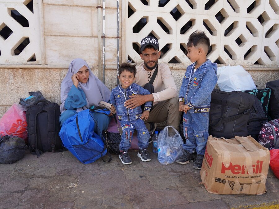 Family at a Syrian border crossing 