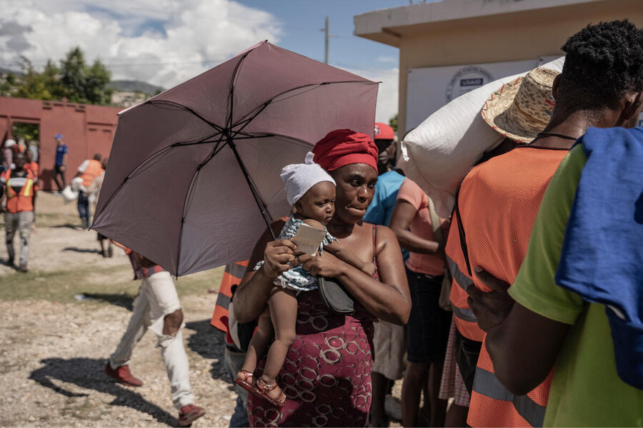 Mother holding her child in Haiti