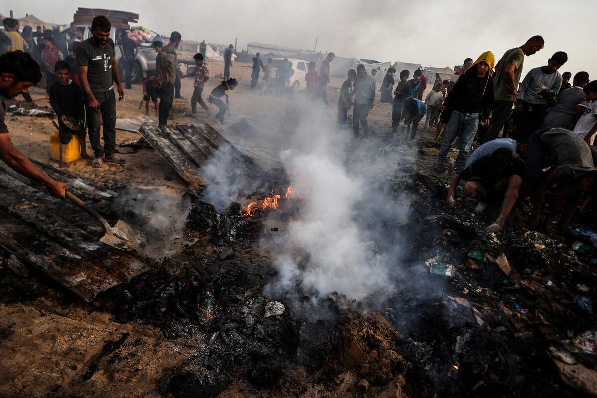 Gazans inspecting an IDP site after an airstrike