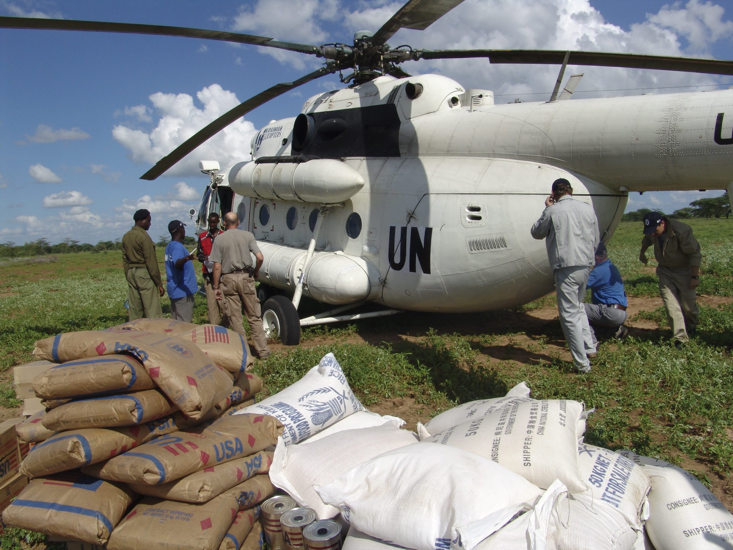 Northeast Kenya, Gurufa, December 2006

A Mi-8 helicopter chartered by the United Nations World Food Programme delivers relief aid to maroooned villagers on 2/12/06 at Gurufa village, 150 kilometres north of the eastern Kenyan town of Garissa. The emergency supplies were distributed among thousands of people forced to move to higher ground by floods. They asked for the food to be distributed quickly because they feared it would rain again soon and they would be forced to move again to even higher ground by fresh floods

Photo:WFP/Stephanie Savariaud