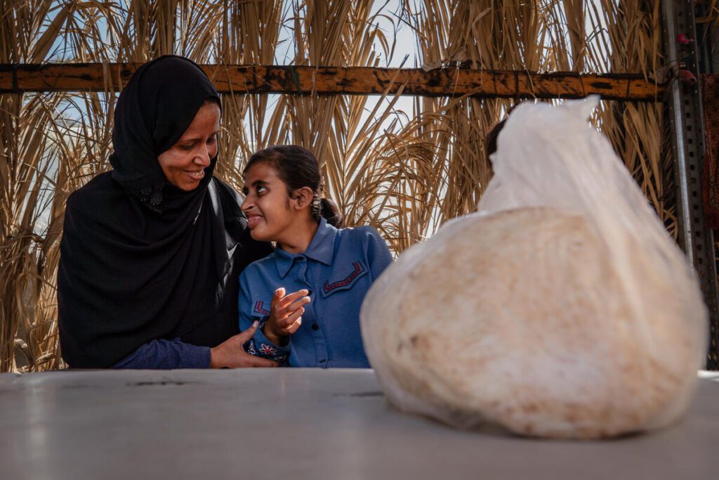 A family in Gaza receives bread
