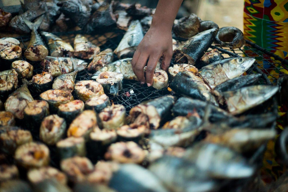 Salome, one of 430,000 HIV positive people in Côte d&#039;Ivoire,  looks after the cooking of her smoked fish. It is a popular food choice in the country, and Salome relies on selling it to make end&#039;s meet. With the arrival of the Covid-19 pandemic, her business shrank and she struggled to buy the nutririous food she needs to take the Anti-Retroviral drugs she needs for the HIV treatment.

To support people living with HIV during COVID-19, WFP in Abidjan, Cote D’Ivoire piloted a cash-transfer project together with The United Nations Joint Program on HIV &amp; AIDS (UNAIDS). WFP work with governments, partners, and communities to provide food, nutrition assistance and social protection services for people living with or affected by HIV and TB, including in emergency settings. Since 2020, WFP has provided support to over 1,000 people in Abidjan, Cote D’Ivoire who have faced the socio-economic impact of COVID-19. 

 

Malnutrition and food insecurity continues to affect vulnerable people, especially those living with HIV. WFP’s cash-transfers project has been piloted in several countries including Cote D&#039;Ivoire and Chad to improve nutritional outcomes among food insecure and malnourished people living with HIV. WFP continues to deliver food or cash transfers in that regard.  

 

Food insecurity is one of the key drivers associated with increased transmission of HIV and can be a barrier to treatment adherence while malnutrition is linked to higher mortality rates among new ART clients. Antiretroviral therapy (ART) is key to people living with HIV and reaching the goal of eradicating AIDS as a public health threat by 2030, non-medical aspects of the epidemic also need to be addressed. 

 

WFP hired externals to film and permit the agency to demonstrate how it is working to respond to the needs of people living with HIV through specific interventions in Grand Abidjan, Cote D&#039;Ivoire.  

  

WFP identified beneficiaries/contributors to give their testimonies and take part