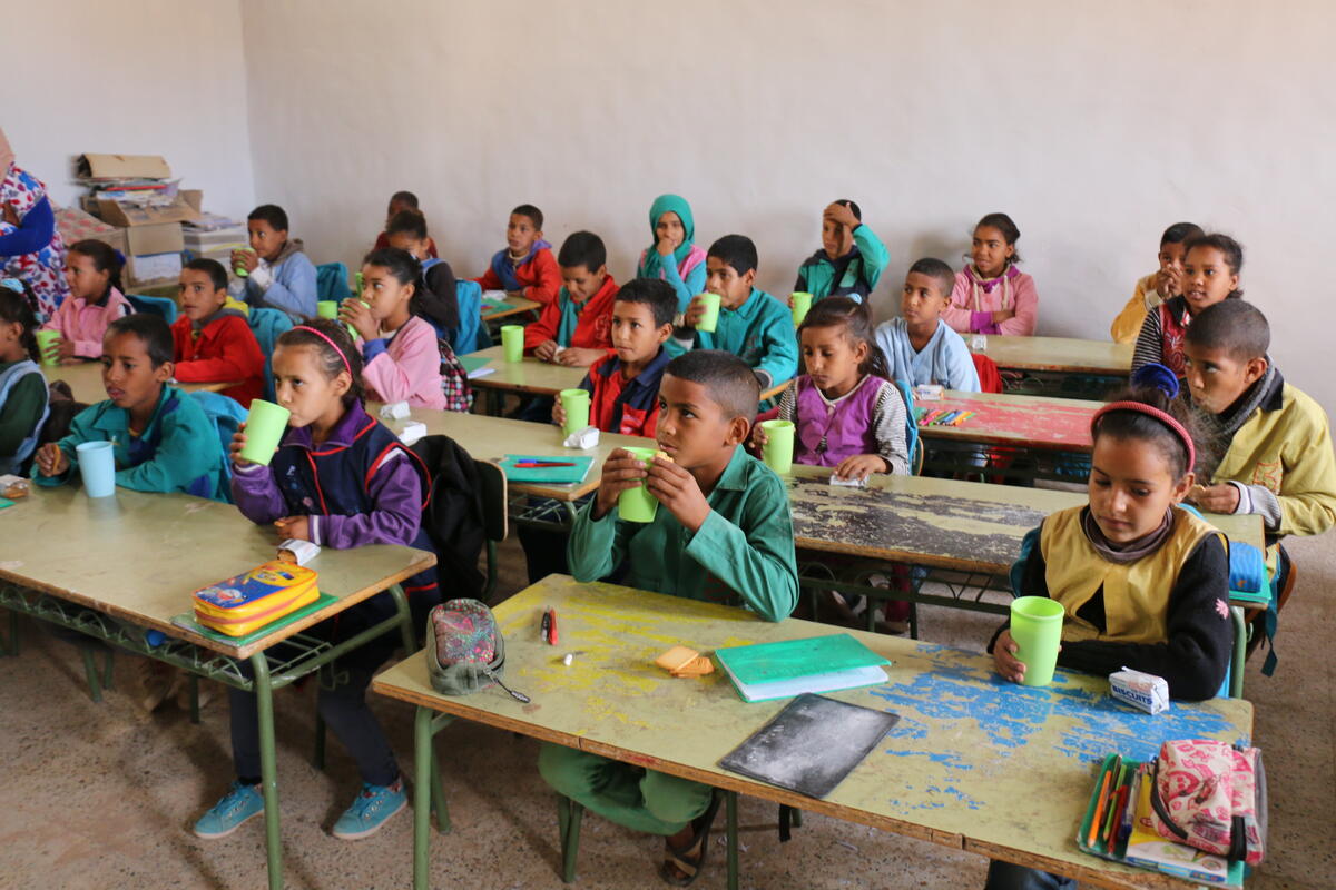 Algeria, Laayoune refugee camp, Tinduf, 29 November 2017

Algeria has hosted refugees from Western Sahara since 1975 in what has become one of the worldÕs most protracted refugee crises. The Sahrawi refugees are located in five camps near the town of Tindouf in Western Algeria. The harsh and isolated desert environment limits opportunities for self-reliance and, as a result, the refugees depend on humanitarian assistance for their survival.

WFP provides mid-morning snacks Ð in the form of milk, fortified biscuits and if available dates Ð to 40,500 children in 70 primary schools and kindergartens. WFP also rehabilitates and constructs school kitchens and stores.

In the photo: School meals in Laayoune refugee camp.

Photo: WFP/Lourdes Melendo