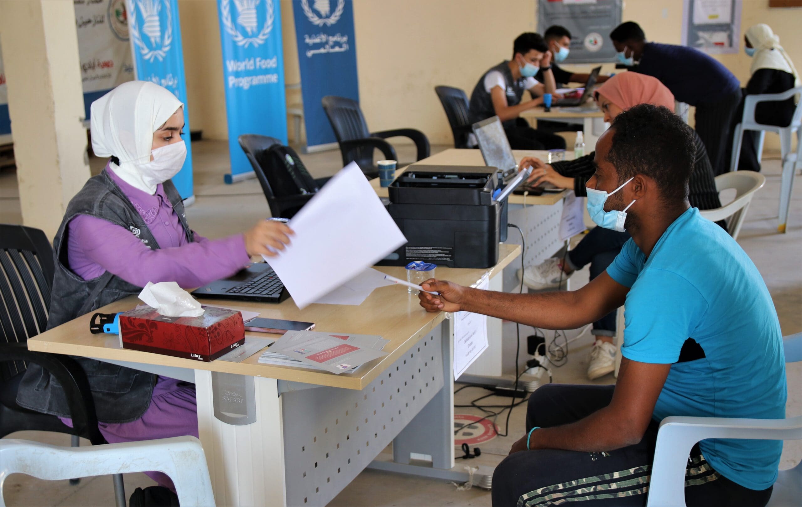 Beneficiaries at the WFP and UNHCR food distribution centre
