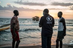 WFP staff with fishermen in Kenya