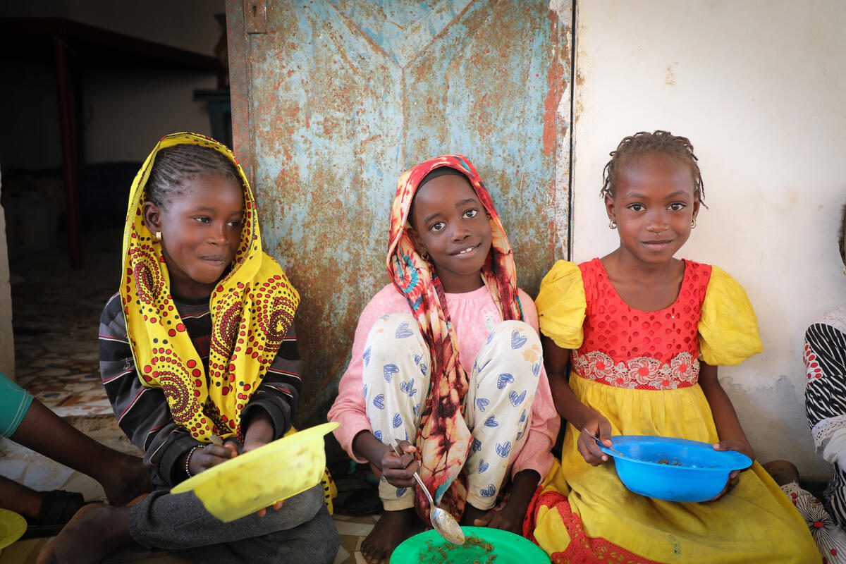 Pupils from Ndem Meissa school enjoy the hot meal provided by the school canteen.

In Senegal, the World Food Programme (WFP) and the Ministry of Education (MEN) through the School Canteens Division have implemented an activity entitled &quot;Restoring the functioning of school feeding in vulnerable public elementary schools&quot; which aims at providing regular school feeding for four months to vulnerable children in priority in academies located in the areas most affected by the COVID-19 pandemic, In the Diourbel region, the project aims to provide regular school feeding for four months to vulnerable children in priority academies located in the areas most affected by the COVID-19 pandemic, to ensure their retention in school and to improve their learning capacity for the general resumption of the 2020/2021 school year.

In the Diourbel region, more precisely at the Ndem school, this initiative has been successful, leading to an increase in enrolment. This has ensured that the activity has been extended beyond the 4 months thanks to additional funding from WFP. 

However, with the rise in food prices in the markets due to the COVID-19 pandemic and the crisis in Ukraine, parents of pupils in the Ndem school now have to send their children with a loaf of bread in addition to the meal provided in the school canteen. This is an expensive expense for these farmers, most of whom have seen their harvests reduced as a result of the low rainfall recorded in 2021.