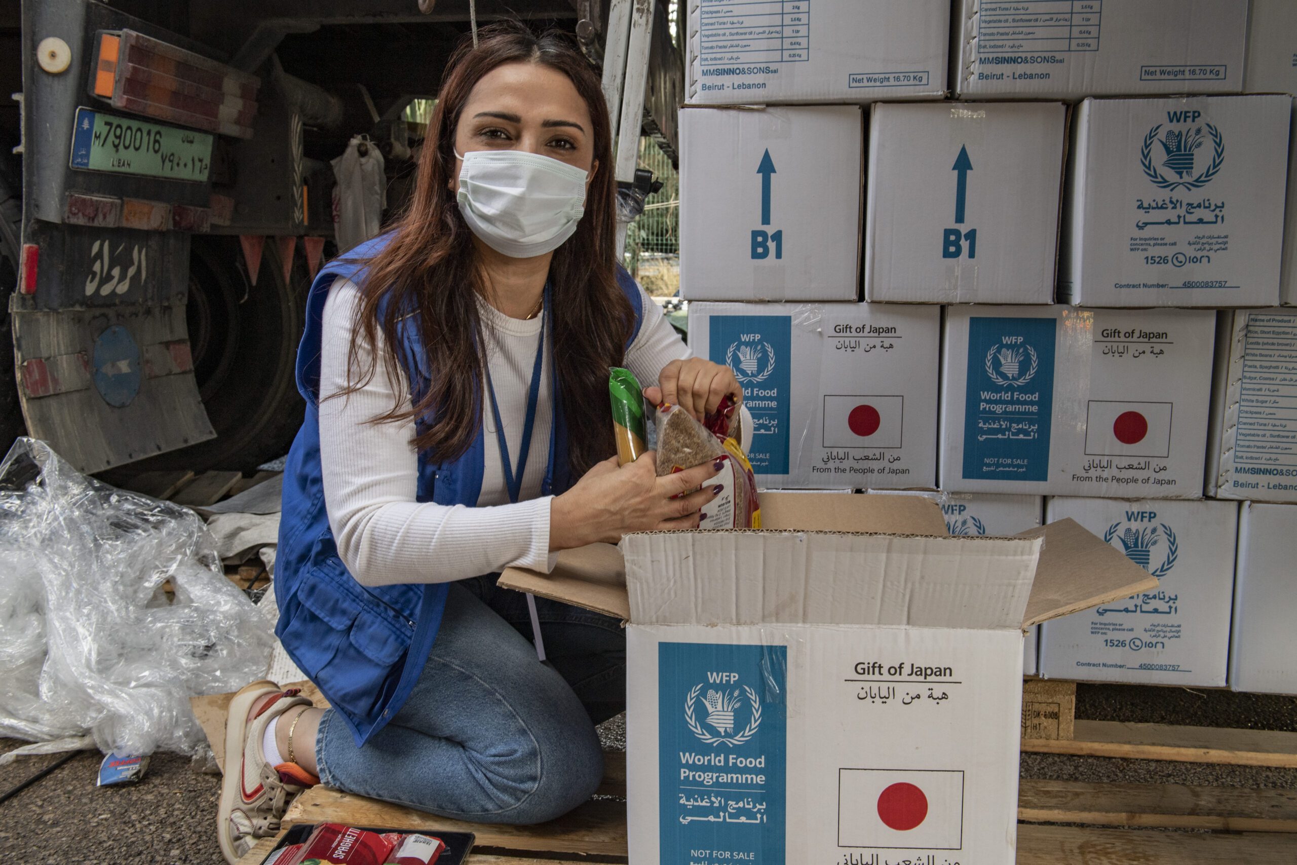 Lebanon, Beirut  25 November 2022

Ms. Massar Karaouni, Field Monitoring Assistant

WFP Monitors in-kind food distribution operations to make sure that the activity runs smoothly between the implementing partner and the people we help. If any issue gets raised, related to food parcels being delivered for example, WFP staff are on the available on the ground and can be approached directly with inquiries.

“I joined WFP two years ago as a field monitoring assistant, over the last three months I have been acting as the focal point for in-Kind distribution. I consider this as a growth opportunity in my career but what really brings happiness to my heart is to be able to help and to see the people’s gratitude and relief when they receive their food parcels, or whenever someone has a complaint or issue I am able to be in contact with him or her and do my best to solve the problem, after all this is what we all aim for, to help humanity somehow, so playing a role in making someone happy or relieved from hunger fuels my motivation to come to work every day and do my best in my job to fulfill that goal. ”

At the height of the COVID-19 pandemic, in-kind food was chosen as WFP’s initial crisis response to mitigate the risk that people would not be able to go to shops or ATMs because of lockdown measures. Now, WFP provides in-kind food assistance to mitigate the risks of market volatility and threats to food availability and access.
The provision of food parcels helps counter the impact of inflation and decreased purchasing power for families, freeing up resources to cover their other basic needs.
Assistance is delivered as a monthly family food ration designed to provide 95 percent of the total individual energy requirement. The baskets are being procured both locally and internationally, and include rice, pasta, bulgur, lentils, beans, chickpeas, canned tuna, vegetable oil, salt, vermicelli, tomato paste, and sugar allowing WFP to provide nutritionally balanced food