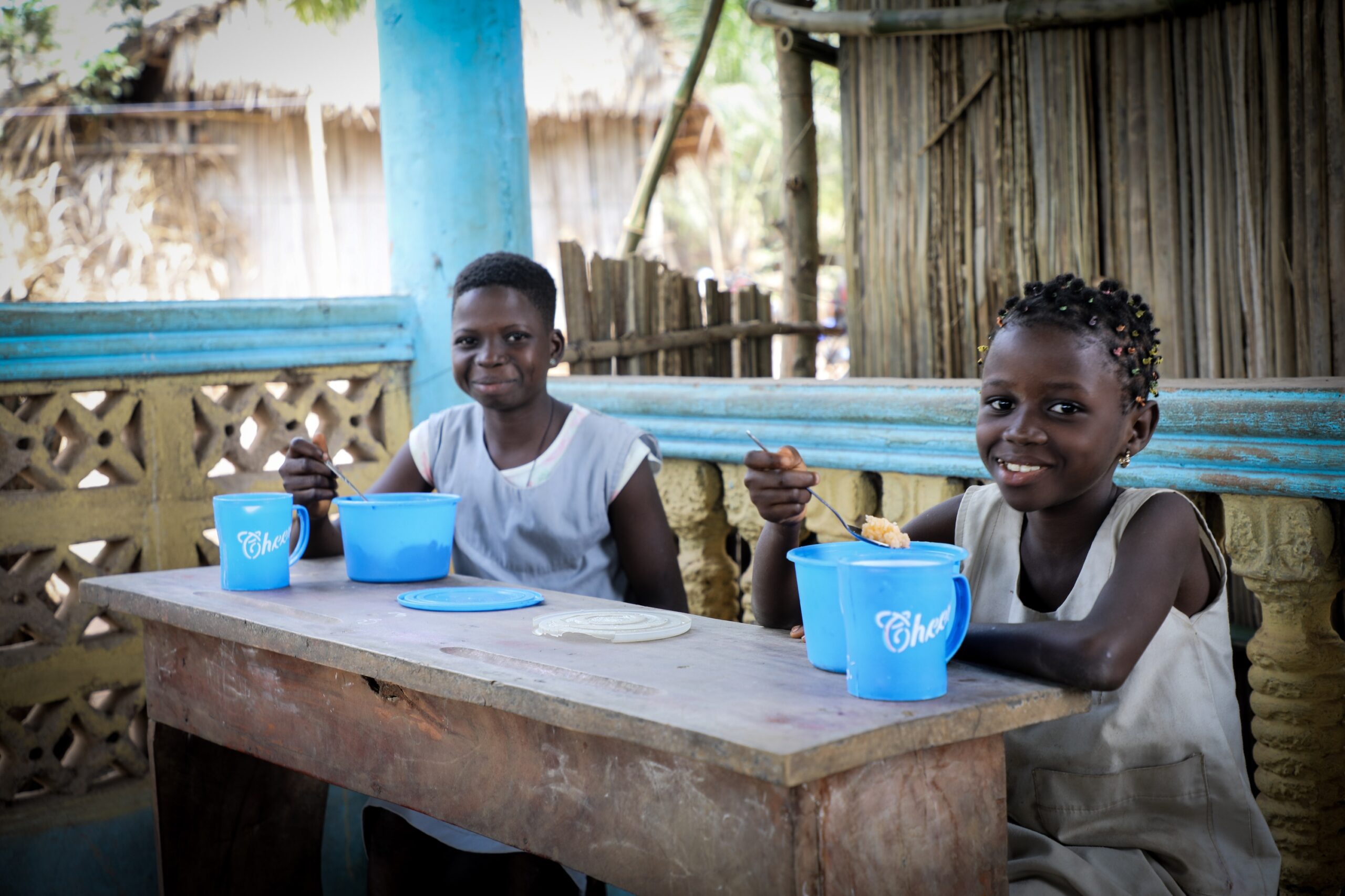 Students of the pupils in Year 6 class enjoy their hot meal in the school canteen of the public elementary school of Fingninkanmè.

In the school of Fingninkanmè, WFP implements school feeding activities and works to strengthen the link with local food purchases from smallholder farmers. The school is one of five schools to receive the 2.8 metric tons of maize provided by Gbenonkpo Smallholder farmers’ cooperative. 
Currently, 131 schoolchildren, including 62 girls (47%), receive a daily hot meal from the canteen. WFP food basket comprises cereals (rice and maize), beans or yellow split peas, vitamin A and D-enriched oil and iodized salt. Community contribution in fresh food products and the school garden fresh produce complement the food basket.