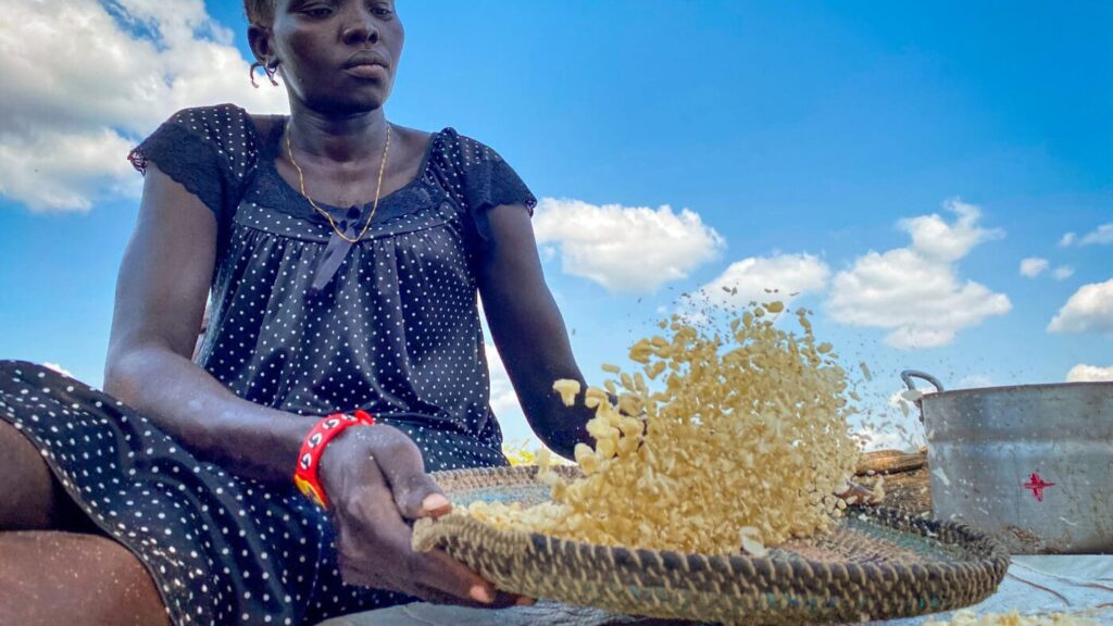 woman sifting and preparing food