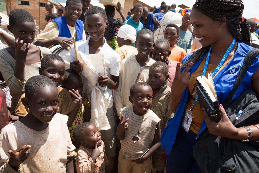 Liberee with children at refugee camp