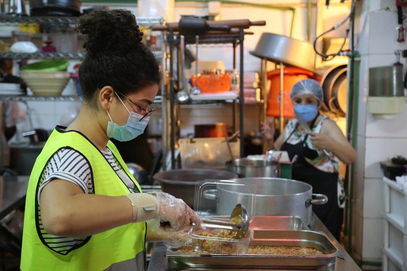 WFP worker packaging food