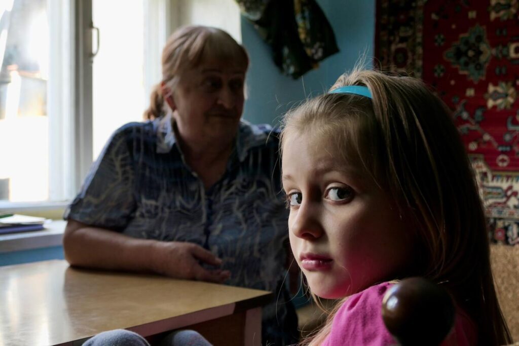 young girl looking at camera