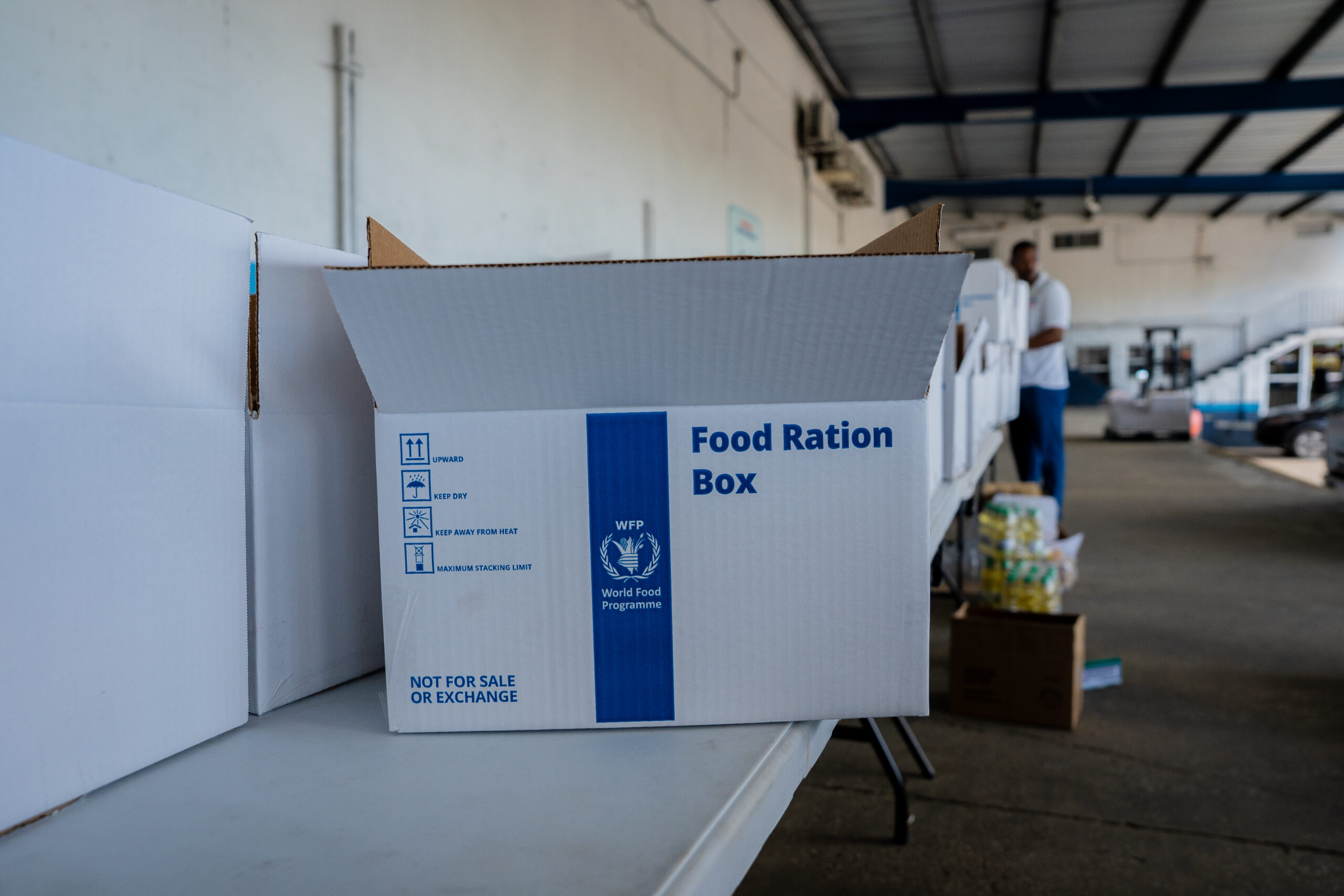 WFP packs food boxes in Barbados