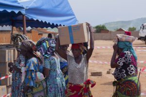 Woman receives box of fortified biscuits