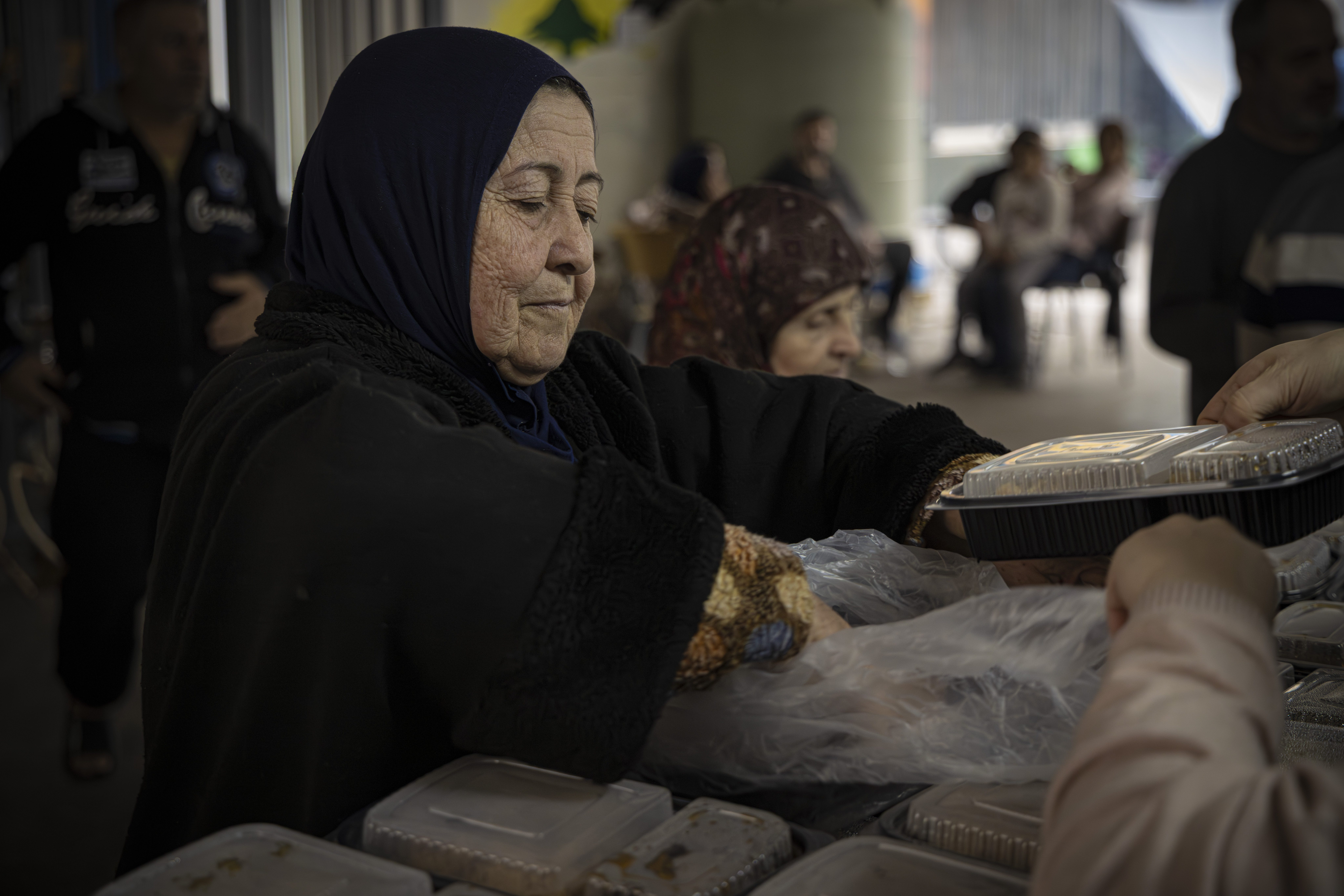 Food distribution to displaced families sheltering in a public school in Beirut